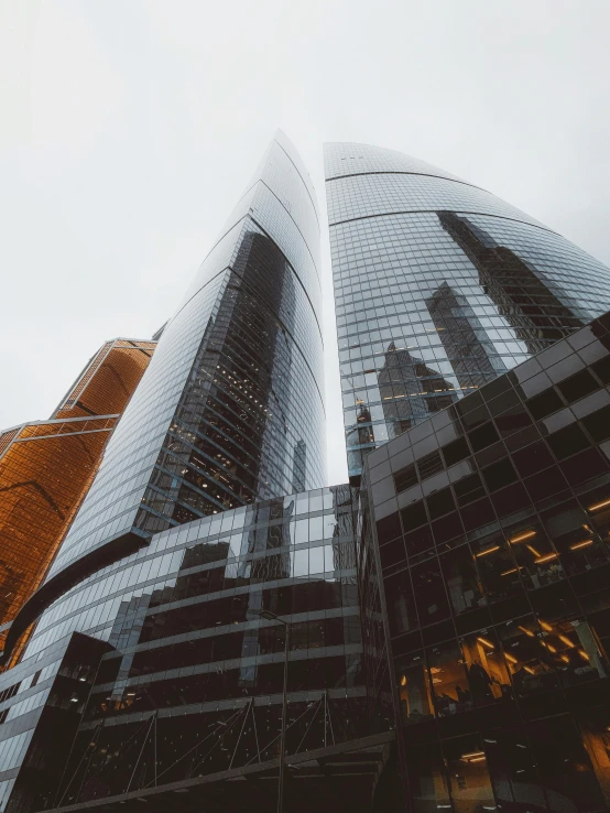 some very tall buildings in a big city, pexels contest winner, russian architecture, in style of norman foster, thumbnail, high quality screenshot