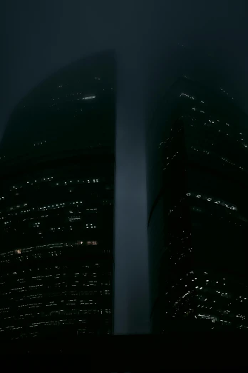 a couple of tall buildings sitting next to each other, by Attila Meszlenyi, shrouded in darkness, 8k)), zoomed in shots, documentary photo