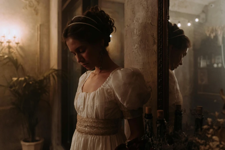 a woman in a white dress standing in front of a mirror, inspired by Sophie Pemberton, pexels contest winner, romanticism, film still from 'tomb raider', regency-era, late evening, in costume