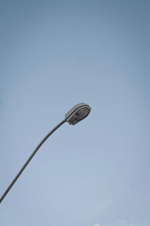 a street light with a blue sky in the background, by Adam Marczyński, postminimalism, square, small led lights, grey, top down