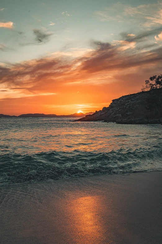 the sun is setting over the water at the beach, pexels contest winner, norway, australian beach, album, brightly colored