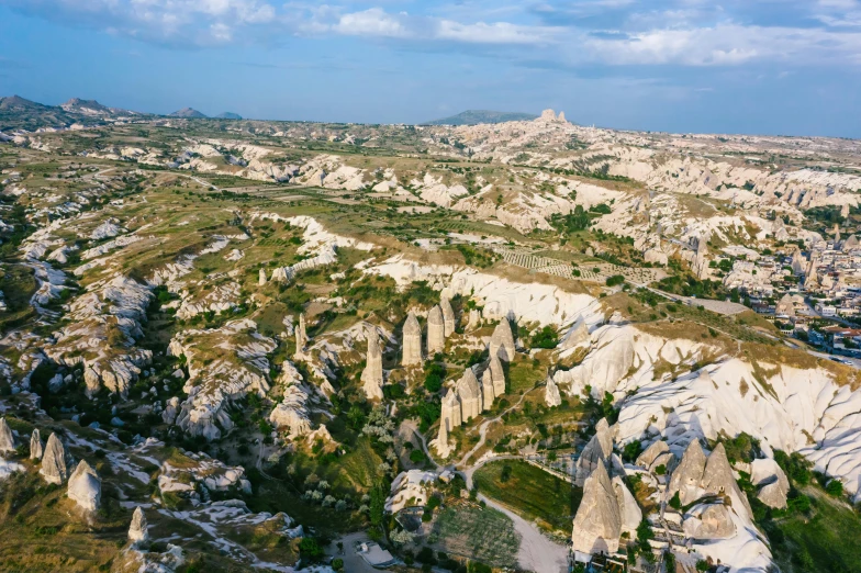 the landscape of cappadin national park in cappadin national park, cappadin, pexels contest winner, art nouveau, 2000s photo, asymmetrical spires, aerial, white marble buildings