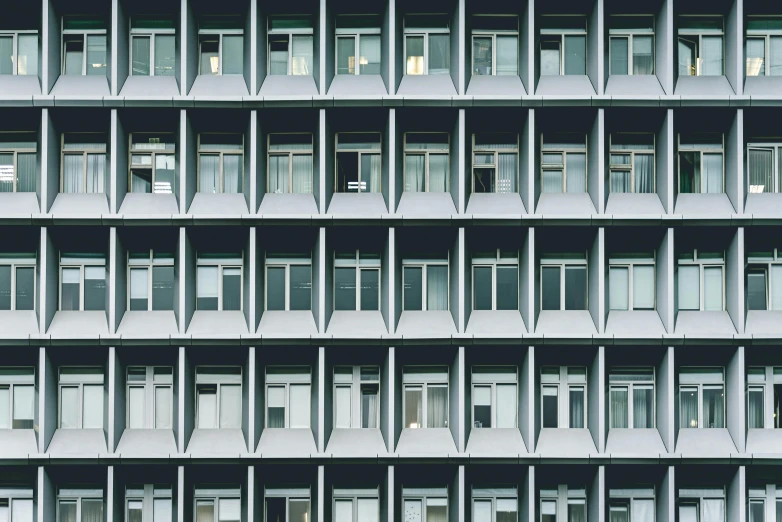 a very tall building with lots of windows, inspired by Andreas Gursky, unsplash contest winner, brutalism, ignant, swiss architecture, square shapes, hyperrealism”