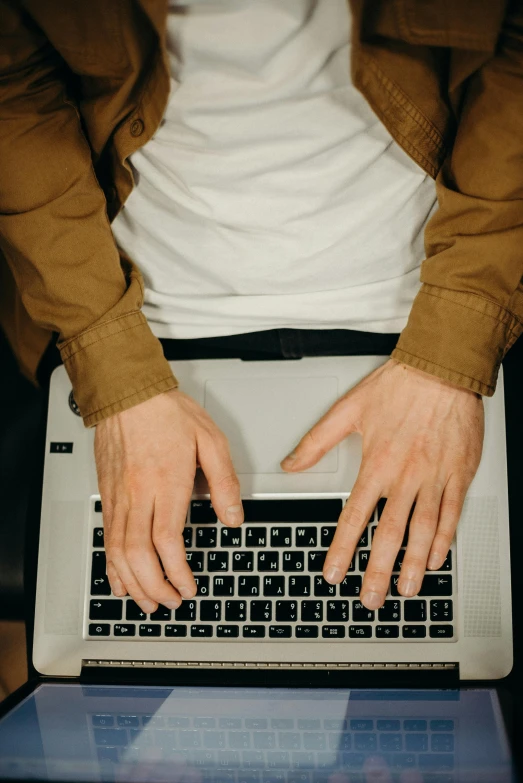 a close up of a person typing on a laptop, by Carey Morris, holding arms on holsters, no - text no - logo, thumbnail, teaching