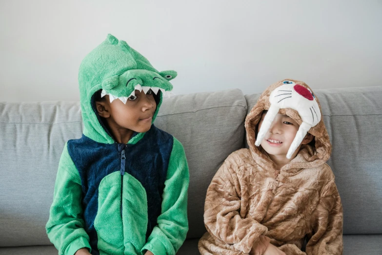two children in animal costumes sitting on a couch, trending on pexels, surgeon, boy with neutral face, diverse ages, crocodile loki