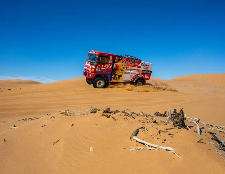 a truck driving through the desert on a sunny day, by Daniel Seghers, pexels contest winner, hurufiyya, rally car, leg high, brightly coloured, profile