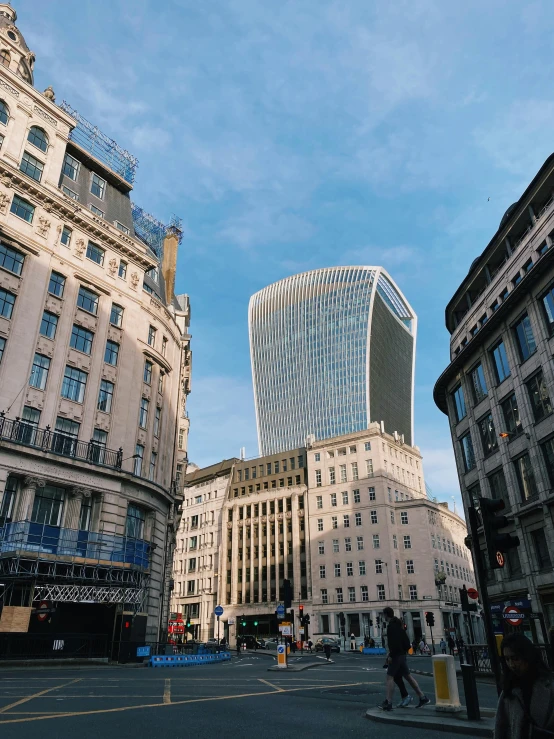 a city street filled with lots of tall buildings, inspired by Zaha Hadid, unsplash contest winner, england, james turrell building, “ golden chalice, slide show