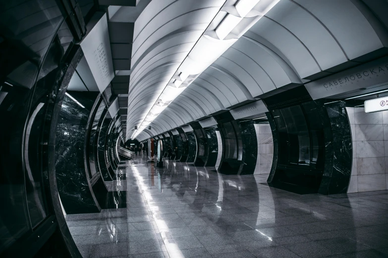 a black and white photo of a subway station, unsplash contest winner, hyperrealism, soviet style cyberpunk, hyperrealistic symmetrical 8k, moscow, shiny floors