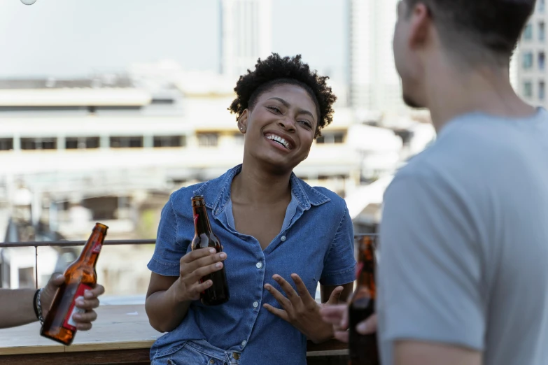 a couple of people that are talking to each other, pexels contest winner, happening, holding a bottle of beer, beautiful city black woman only, avatar image, three views