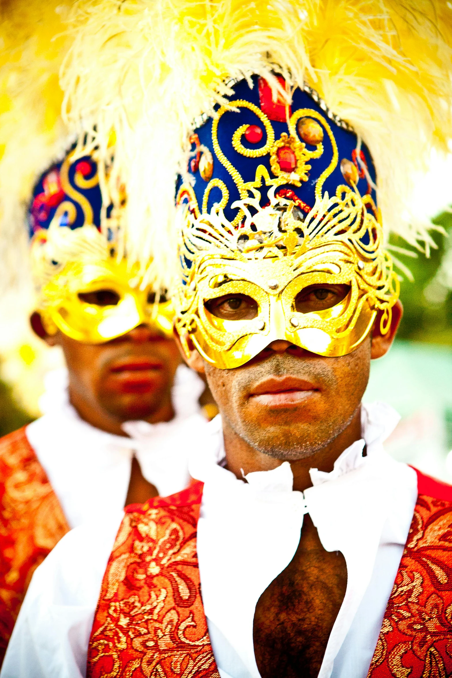 a couple of men standing next to each other wearing masks, an album cover, by Francisco de Holanda, flickr, renaissance, bahamas, closeup!!!!!, rich vivid colors, celebration