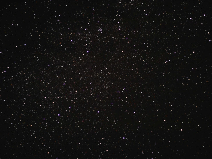 a dark sky filled with lots of stars, by John Covert, pexels, light and space, detailed medium format photo, three fourths view, plain background, the sky is black