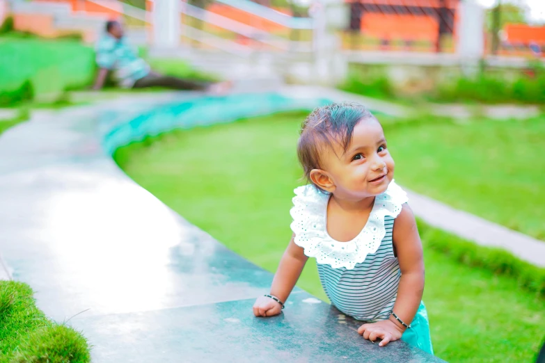 a little girl that is sitting on a bench, activity play centre, jayison devadas, walking at the garden, square