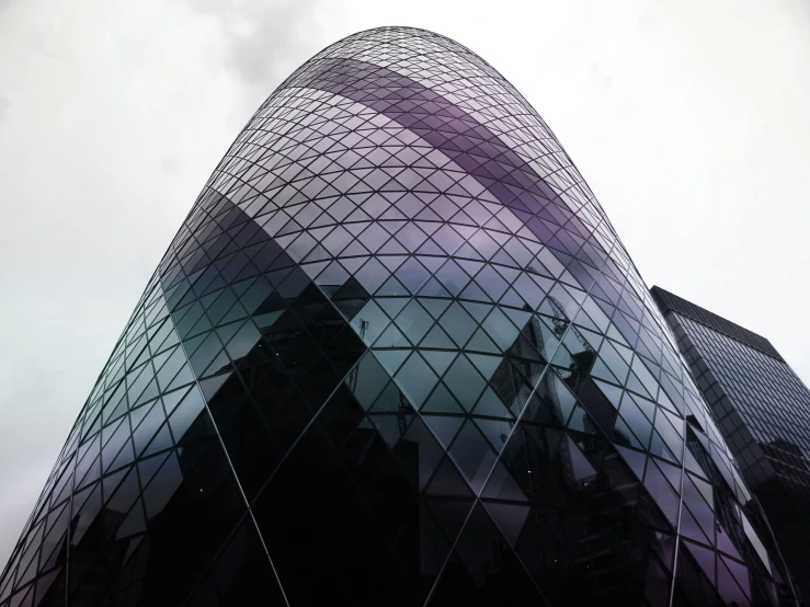 a very tall building with a lot of windows, inspired by Zaha Hadid, pexels contest winner, ornate egg, purple tornado, london, grey