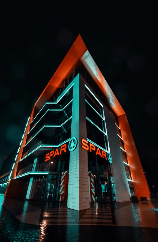 a building that is lit up at night, by Sebastian Spreng, spartan, stark colours, official store photo, sparks