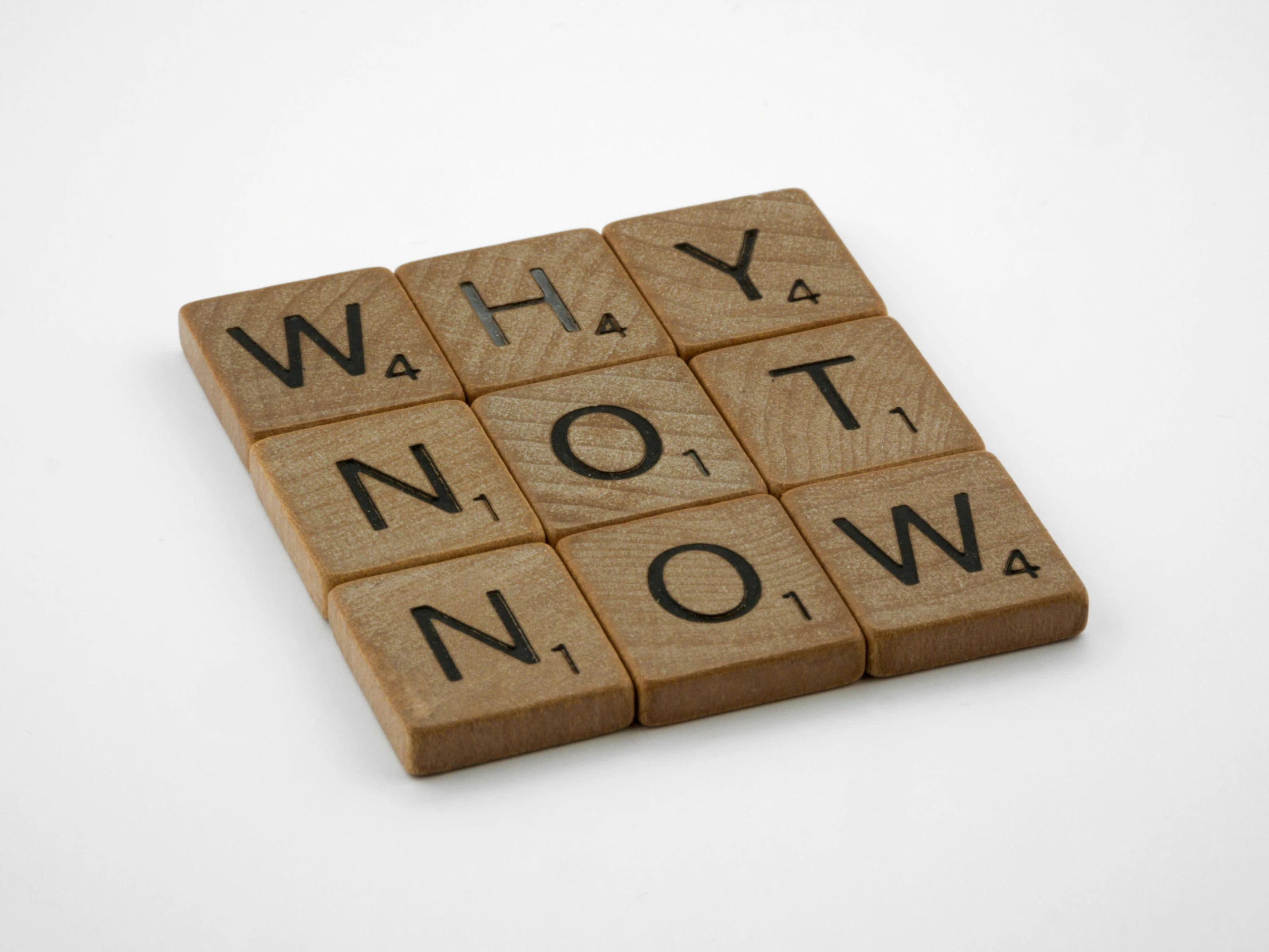wooden scrabbles with the words why not now written on them, beige, wolff olins |, ww1, brown