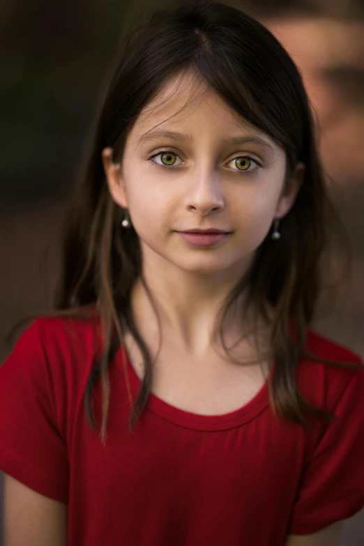 a close up of a young girl wearing a red shirt, a character portrait, by Michael Goldberg, shutterstock contest winner, beautiful light big eyes, square, acting headshot, girl standing