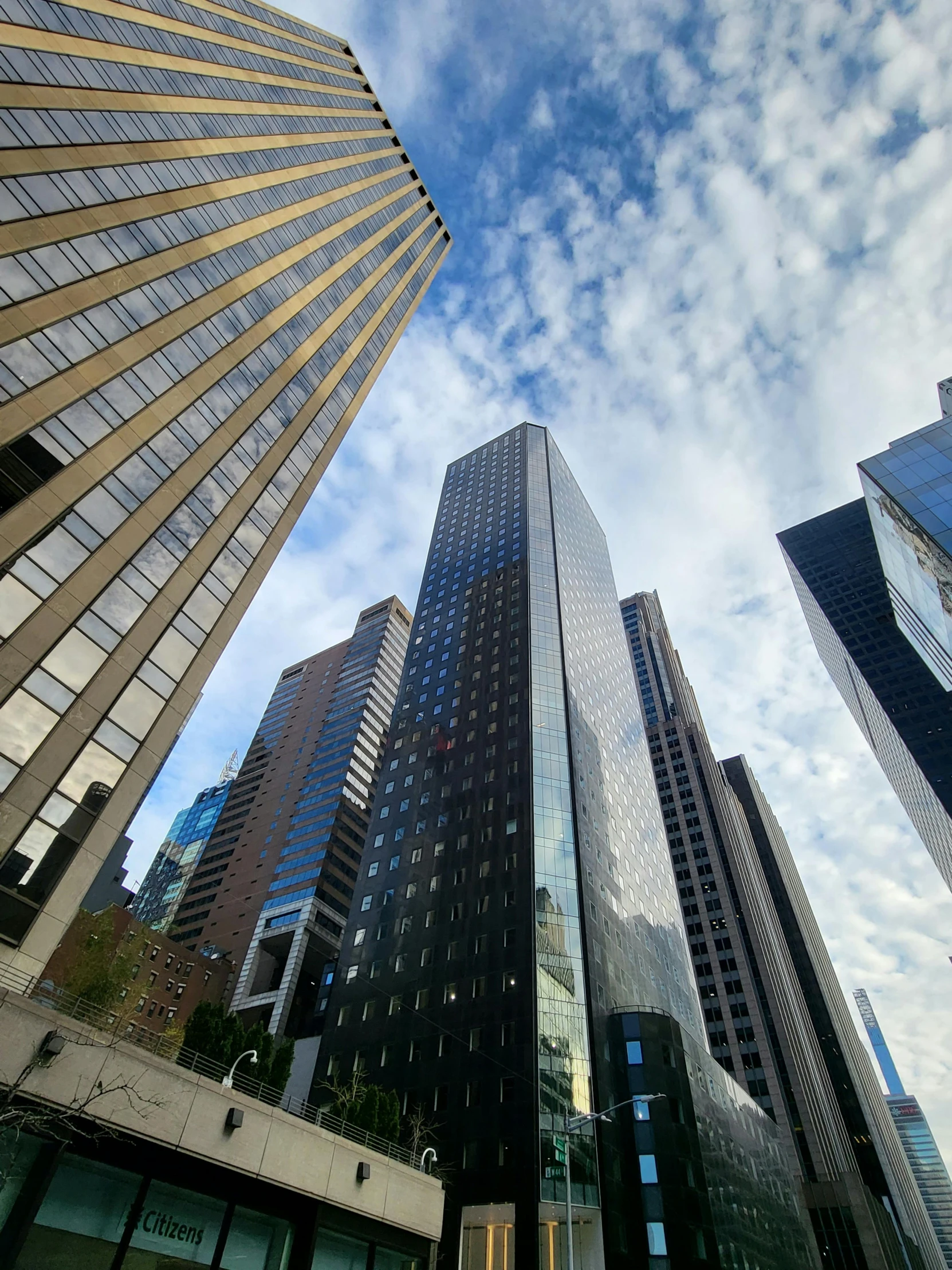 a group of tall buildings sitting next to each other, by Bernie D’Andrea, pexels contest winner, corporate memphis, vancouver, mies van der rohe, high resolution photograph