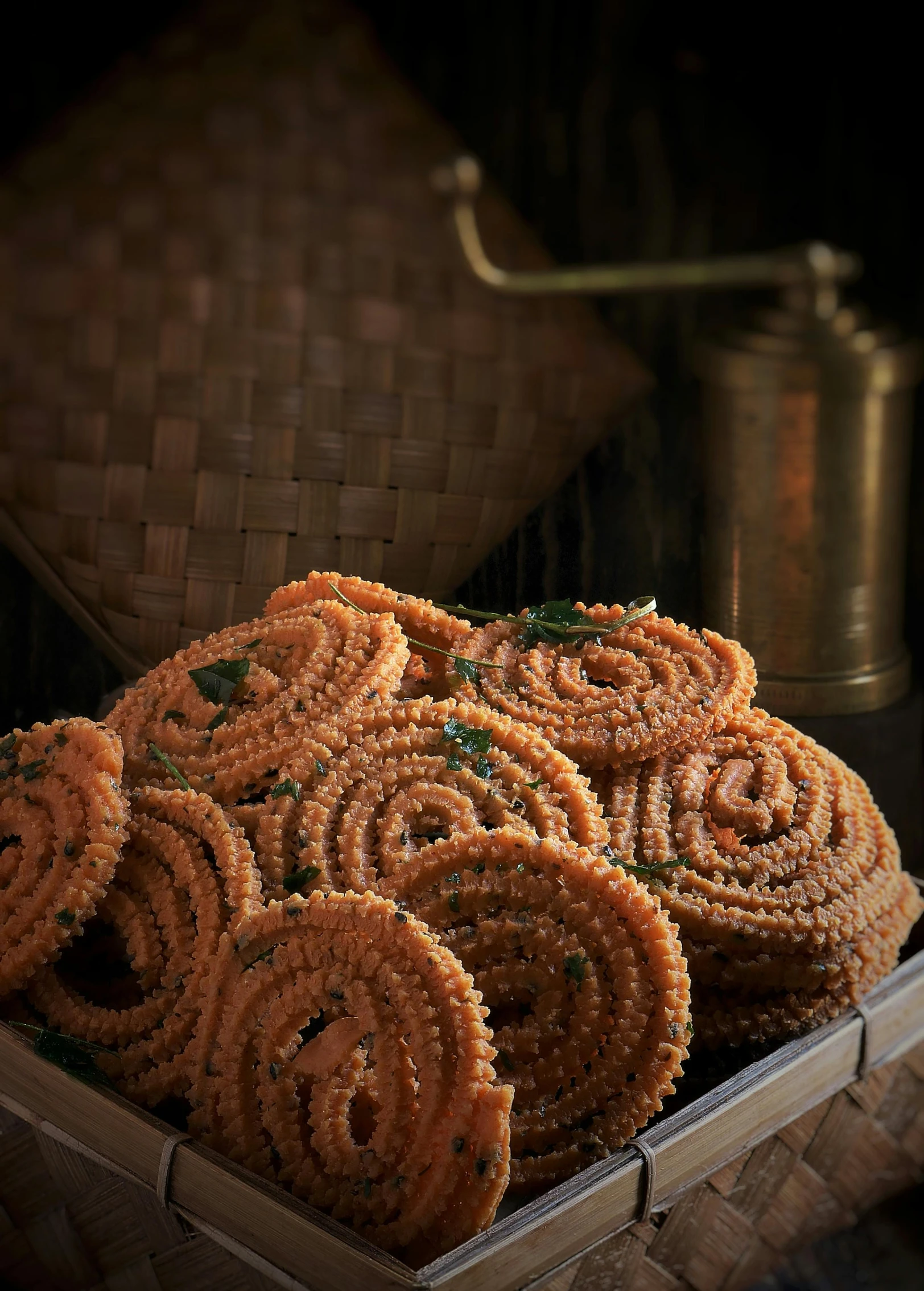 a basket full of cookies sitting on top of a table, hurufiyya, intricate spirals, bangalore, **cinematic, ready to eat