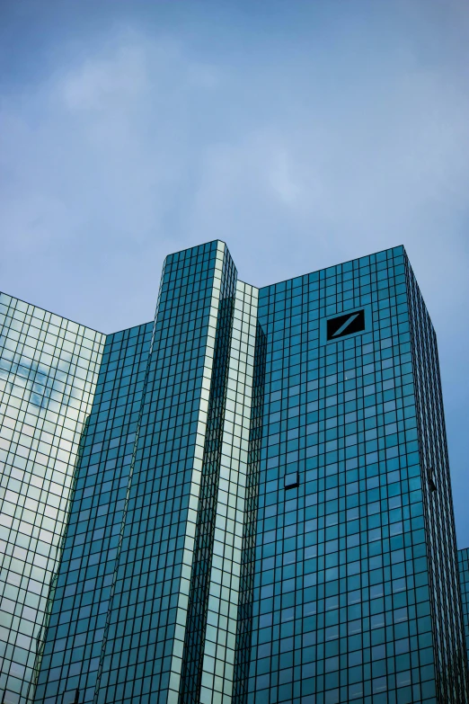 a couple of tall buildings sitting next to each other, an album cover, inspired by Robert Zünd, unsplash, renaissance, bank, azure, klaus schwab, f / 1