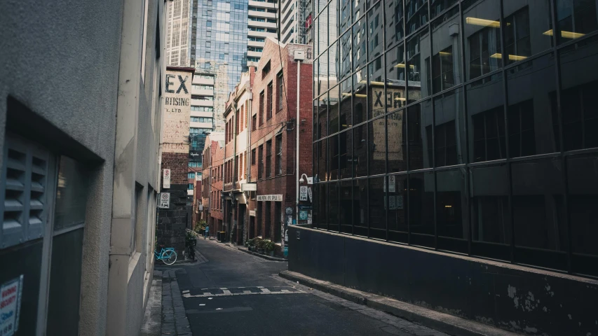 a city street with tall buildings in the background, by Lee Loughridge, pexels contest winner, north melbourne street, clear glass wall, alleys, former