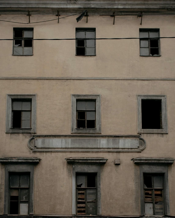 a very tall building with a bunch of windows, an album cover, by Attila Meszlenyi, pexels contest winner, renaissance, dull flaking paint, naples, lgbtq, historically accurate