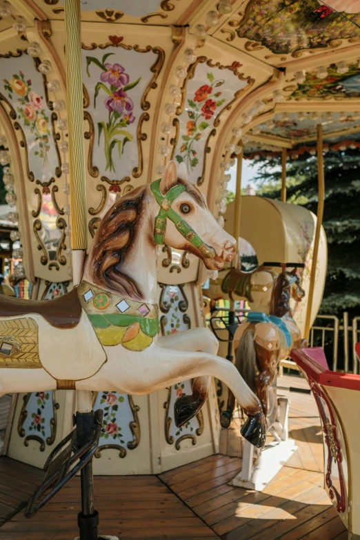 a close up of a horse on a carousel, lush surroundings, chairlifts, demur, fairyland