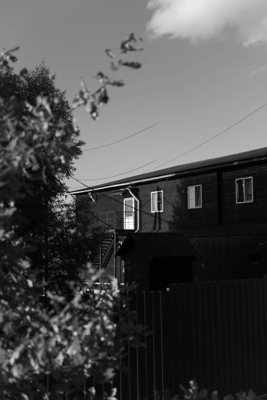 a black and white photo of a house, a black and white photo, inspired by Max Dupain, unsplash, north melbourne street, (golden hour), back rooms, ✨🕌🌙