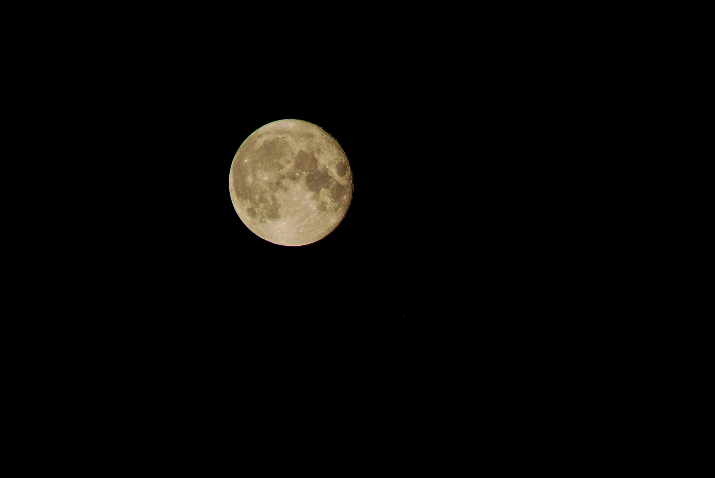 a full moon is seen in the dark sky, an album cover, by Alison Geissler, pexels, minimalism, yellowish full moon, ✨🕌🌙, highly detailed # no filter, astrophotography