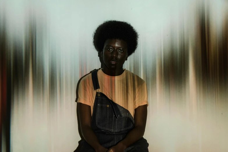 a woman sitting on top of a wooden bench, an album cover, by Winona Nelson, pexels contest winner, afrofuturism, black man with afro hair, standing in a dimly lit room, uniform off - white sky, oil slick