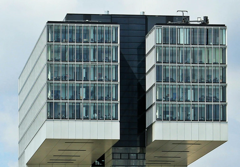 a tall building with a clock on top of it, flickr, bauhaus, munich, fan favorite, cube, julia hetta