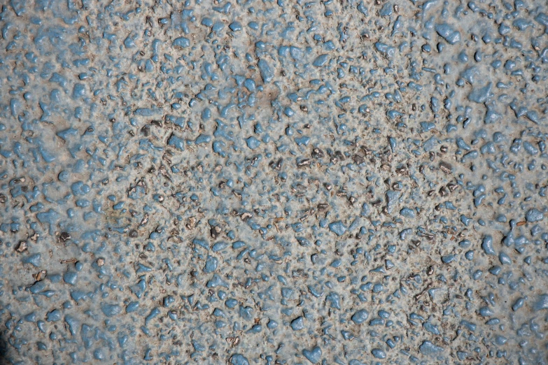 a red fire hydrant sitting on top of a sidewalk, a stipple, inspired by Mark Tobey, soft blue texture, sanjulian. detailed texture, polished concrete, burnt umber and blue