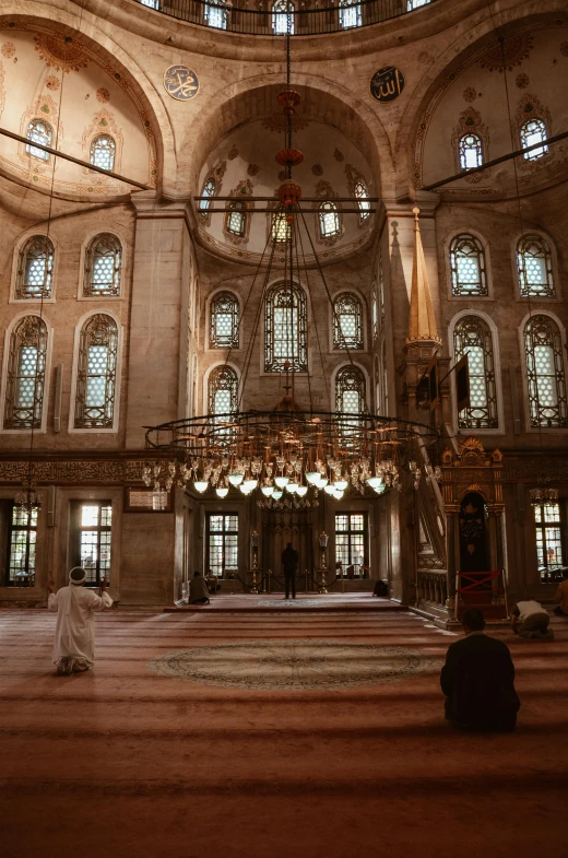 a large room filled with lots of windows and a chandelier, pexels contest winner, arabesque, he is in a mosque, tombs, panorama view, byzantine