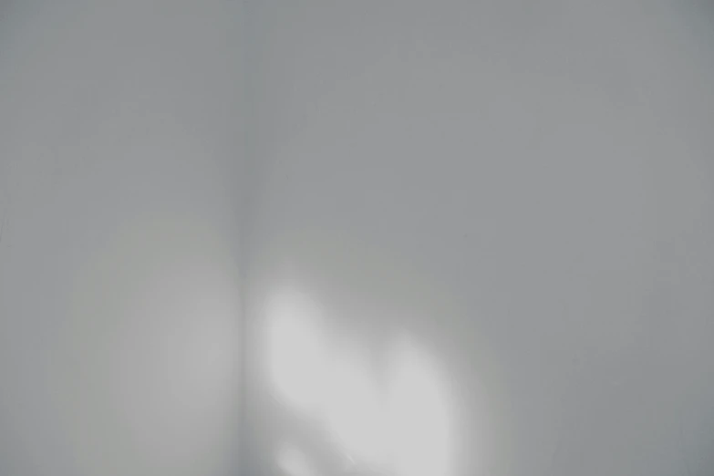 a bed sitting in a bedroom next to a window, an album cover, inspired by Anna Füssli, light and space, background image, occlusion shadow, ((mist)), diffuse fog void