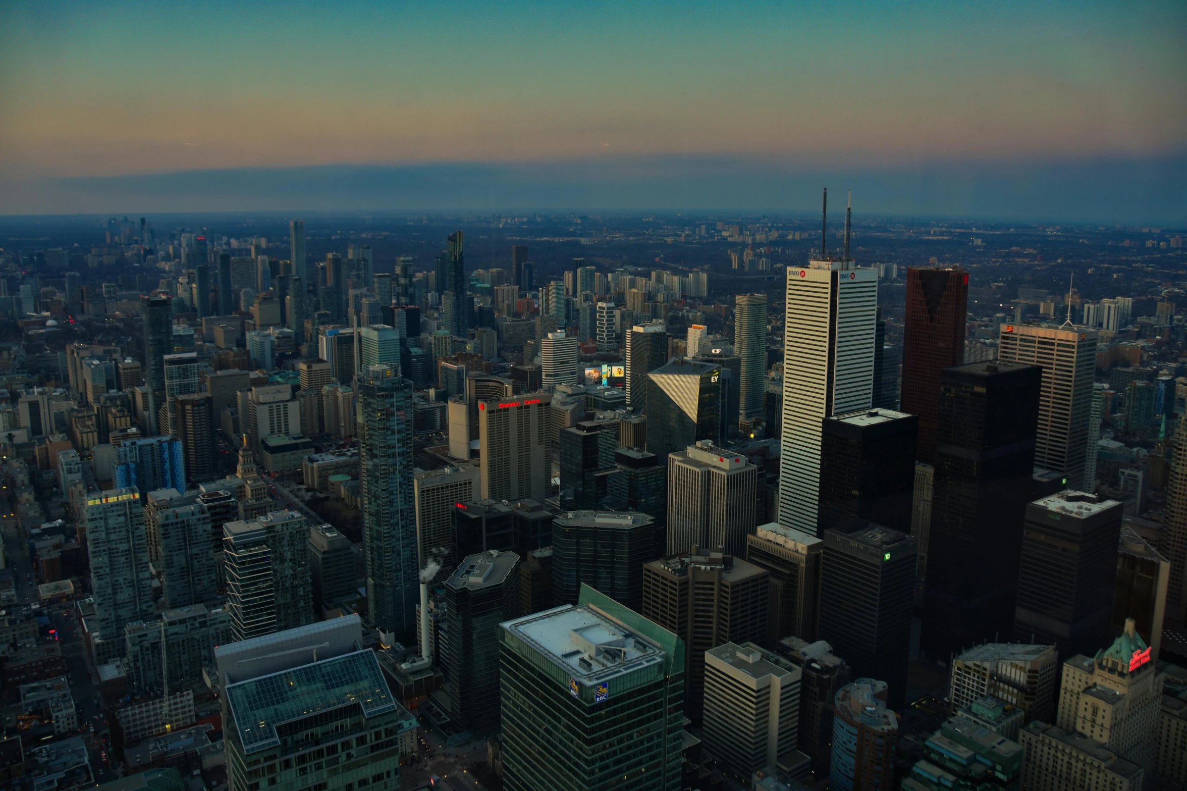 an aerial view of a city at dusk, by Jan Rustem, pexels contest winner, digital art, toronto city, towering, gigapixel photo, group photo