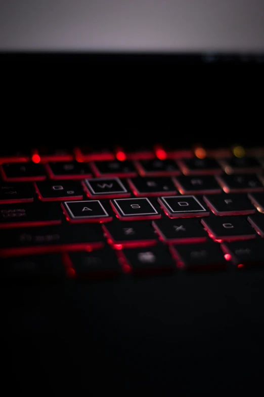 a close up of a laptop computer keyboard, pexels, glowing red, ilustration, dynamic lighting, mmo