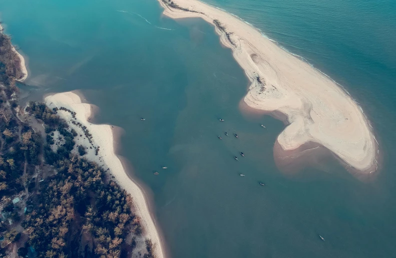 an aerial view of a beach and a body of water, pexels contest winner, hurufiyya, river delta, 15081959 21121991 01012000 4k, thumbnail, peaceful environment