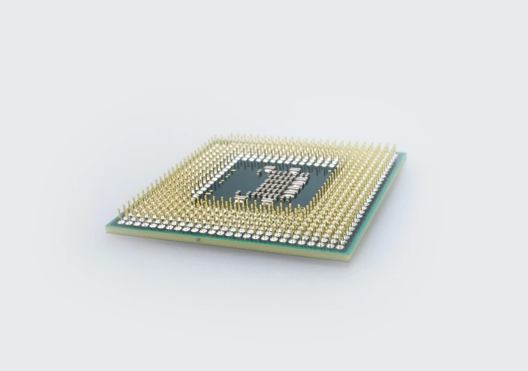 a close up of a cpu chip on a white surface, a computer rendering, pexels, square, vray 8k, 3 dsmax, golden computers