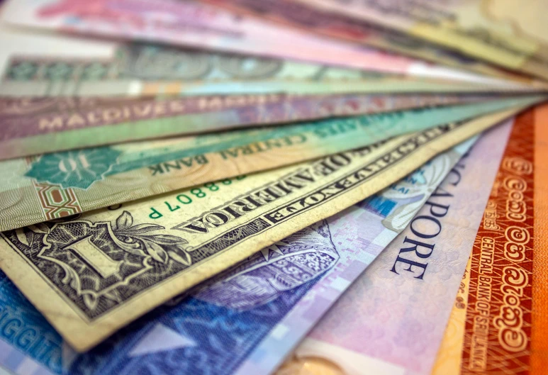 a bunch of money sitting on top of each other, a digital rendering, by Ella Guru, pexels, hurufiyya, colourful close up shot, oman, 2 5 6 x 2 5 6 pixels, photographed for reuters
