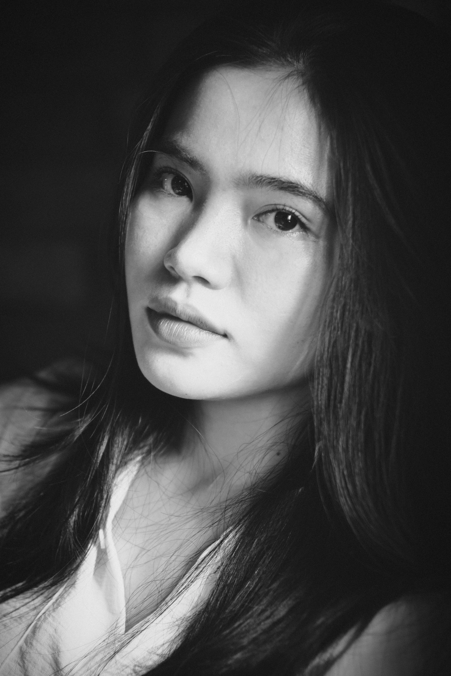 a black and white photo of a woman, inspired by Tang Yifen, unsplash, photorealism, 🤤 girl portrait, beautiful young asian woman, medium format, lovely woman