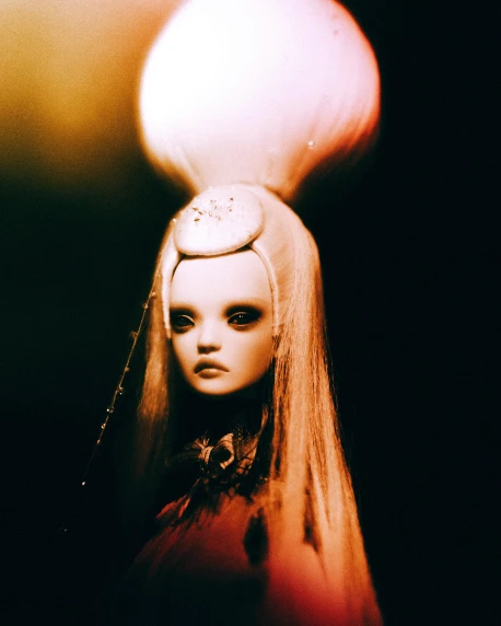 a close up of a doll with long hair, an album cover, inspired by Elsa Bleda, unsplash, pop surrealism, jingna zhang, in a castle on an alien planet, 2 0 0 0's photo, drag