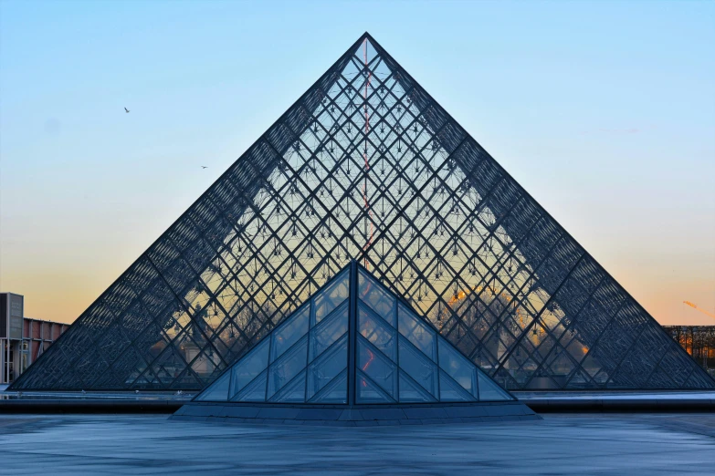 a pyramid shaped building with a sky in the background, by Julia Pishtar, pexels contest winner, visual art, musee d'orsay 8 k, “hyper realistic, huge glass structure, morning lighting
