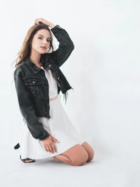 a woman in a white dress and black jacket, by Robbie Trevino, wearing ragged clothing, wearing a crop top, model エリサヘス s from acquamodels, denim jacket