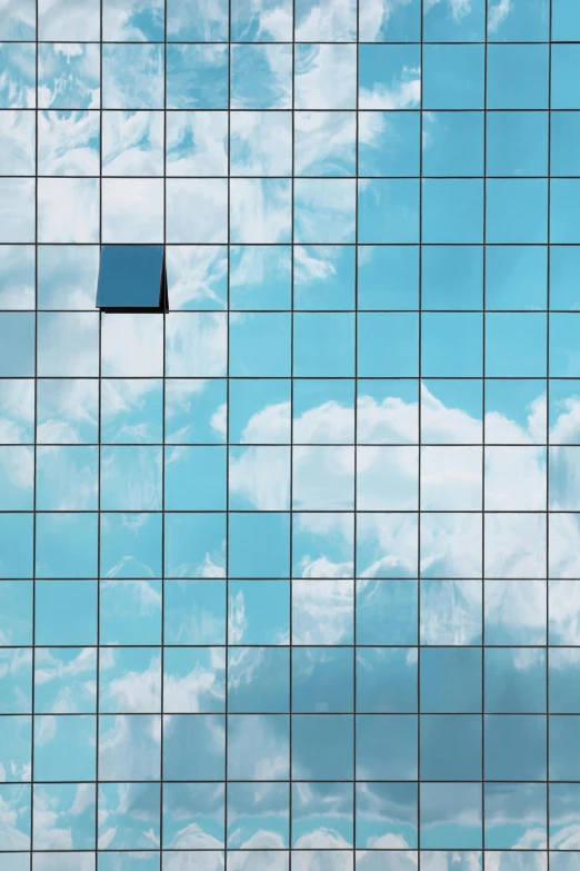 a glass building with a blue sky in the background, an album cover, inspired by Rene Magritte, unsplash, minimalism, tiled, cloud server, square shapes, anna nikonova