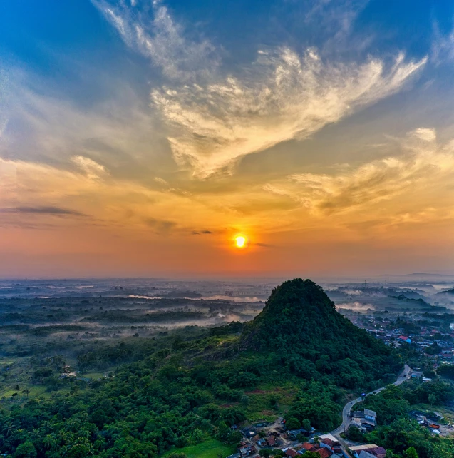 a view from the top of a hill at sunset, by Daniel Lieske, pexels contest winner, sumatraism, thailand, aerial view of an ancient land, guwahati, 8 k 4 k