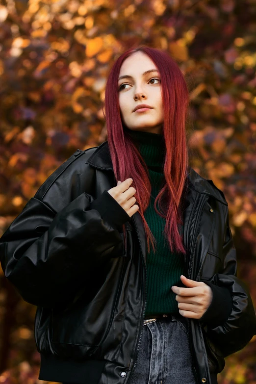 a woman with red hair wearing a black jacket, inspired by Elsa Bleda, trending on pexels, autumn color, rectangle, metallic red, teenage girl