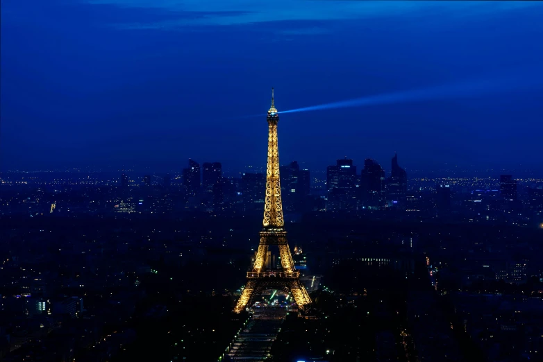 the eiffel tower is lit up at night, pexels contest winner, plain background, 15081959 21121991 01012000 4k, high blue lights, instagram post