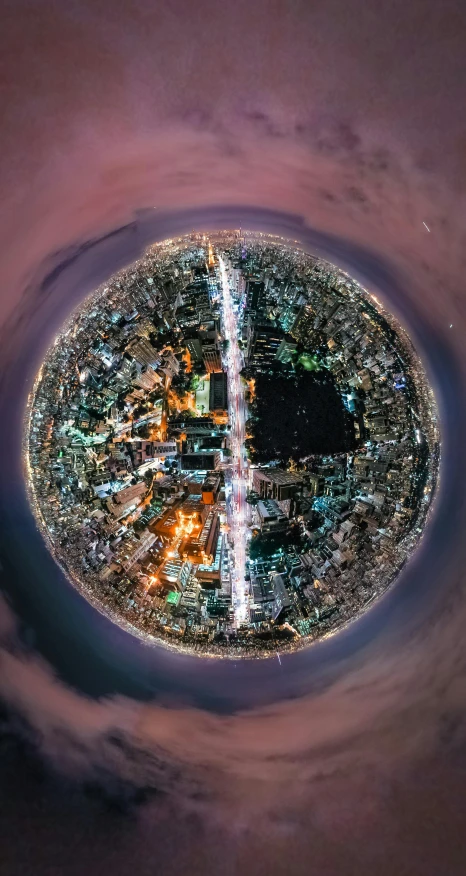 an aerial view of a city at night, an album cover, unsplash contest winner, spherical lens, bangkok, ((fish eye)), seen from planet earth