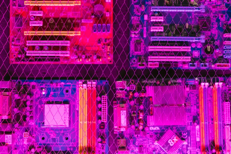 a close up of a computer mother board, by Carey Morris, pexels, computer art, pink and orange neon lights, montage of grid shapes, magenta, stacked computer screens