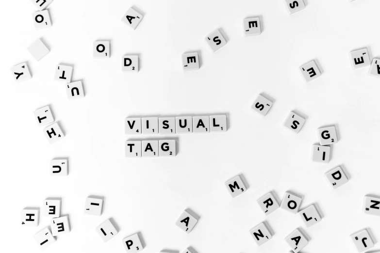 a bunch of scrabbles sitting on top of a white surface, visual art, tag, infographic style, 1 petapixel image, word