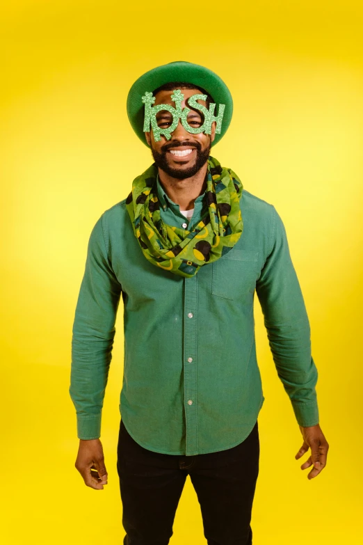 a man in a green shirt and a green hat, inspired by Ras Akyem, trending on unsplash, kitsch movement, scarf made from spaghetti, promotional photo, hulkish, ted nasmit